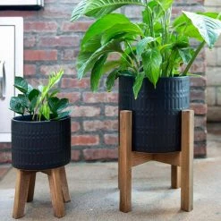 Flora Bunda 10 in. and 8 in. Matte Black Ceramic Roman Planter on Wood Stand Mid-Century Planter (Set of 2) -US Flora Bunda Sales 2022 matte black flora bunda plant pots ct740e2 mtbk 4f 1000