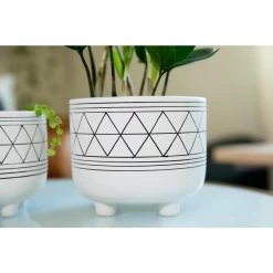 Flora Bunda 6 in. and 5 in. White/Black Ceramic Line Geometric with Legs Mid-Century Planter (Set of 2) -US Flora Bunda Sales 2022 white black flora bunda plant pots ct246e2 blk 1f 1000